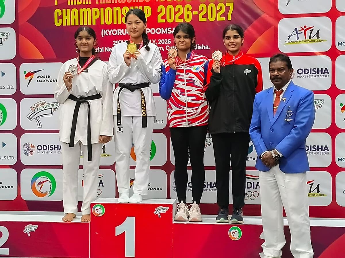 Champion celebrating a gold medal moment on the podium